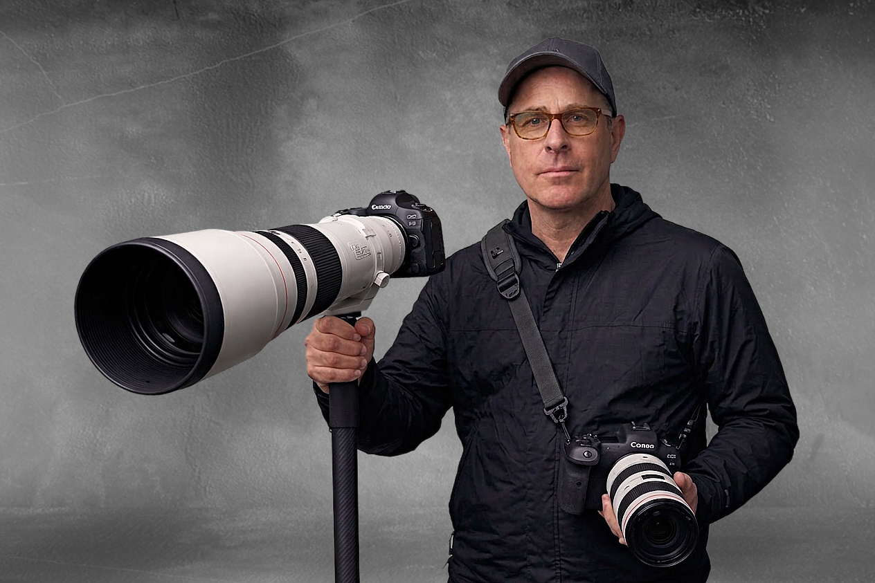 John Belancik holding a camera